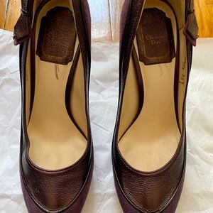 Aubergine metallic leather/suede platform heels.